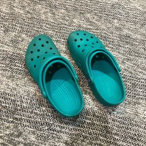 teal crocs
